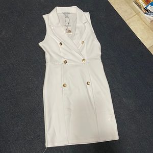 White, stretch, tight fitted dress. I don’t know the proper name for the dress.